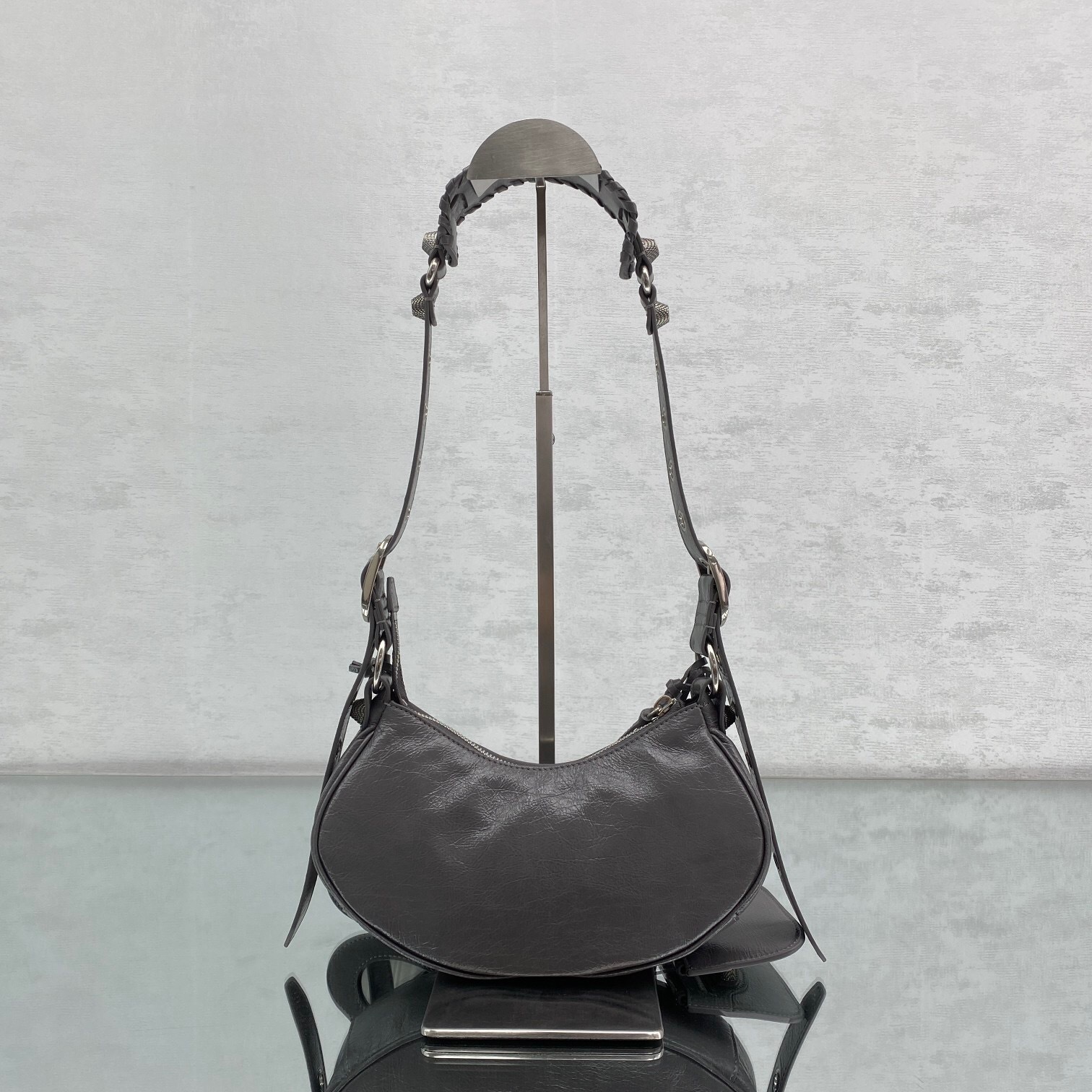 Balenciaga Le Cagole XS shoulder bag in dark grey or silver crinkled leather
