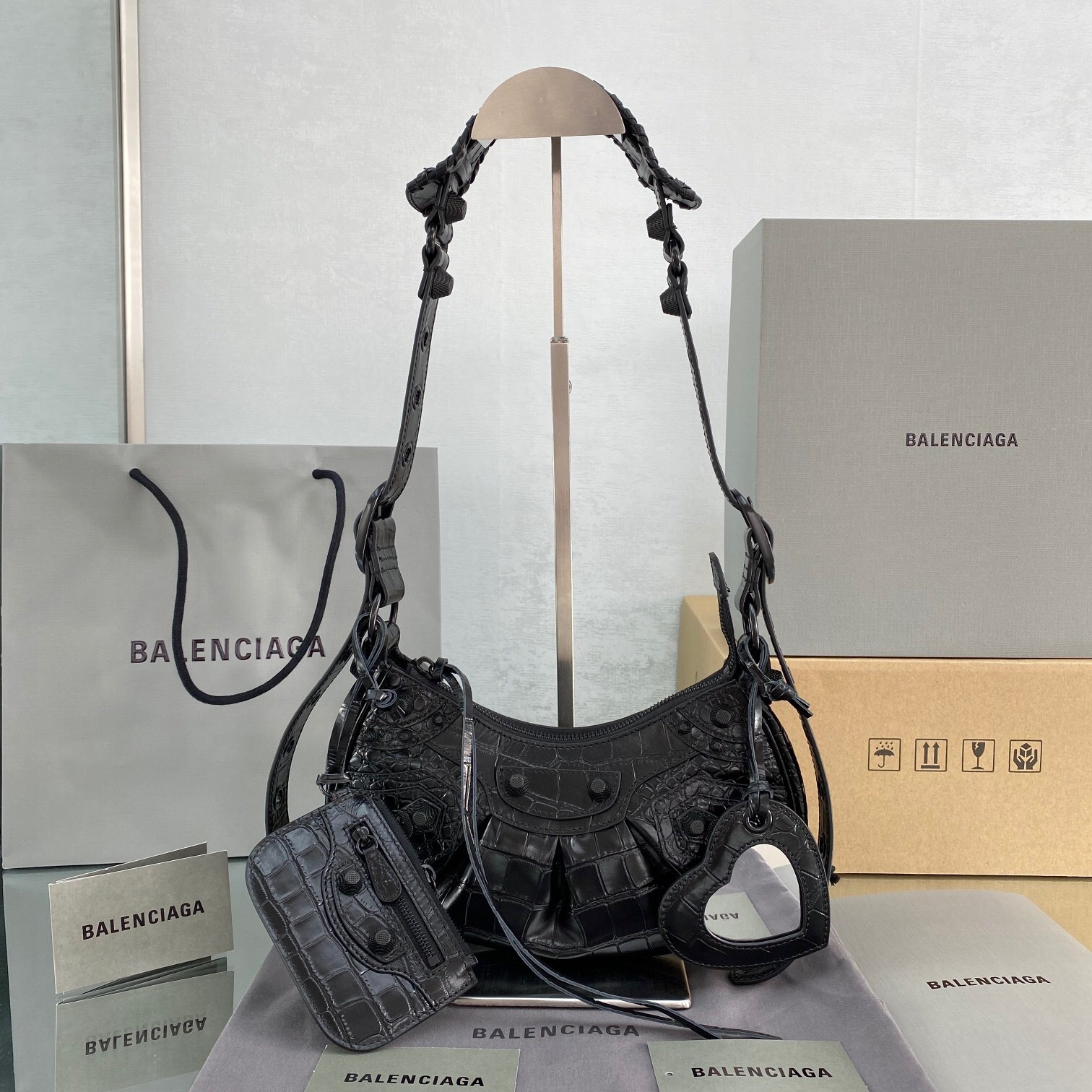 Balenciaga Le Cagole XS shoulder bag in black calf leather