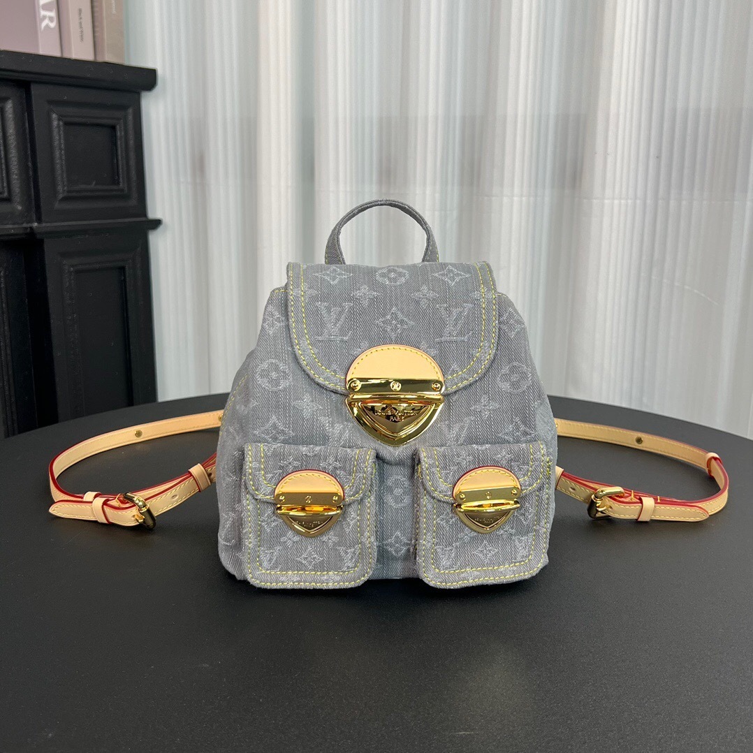 LV Venice Backpack in washed pink Monogram Denim with light gold-toned hardware
