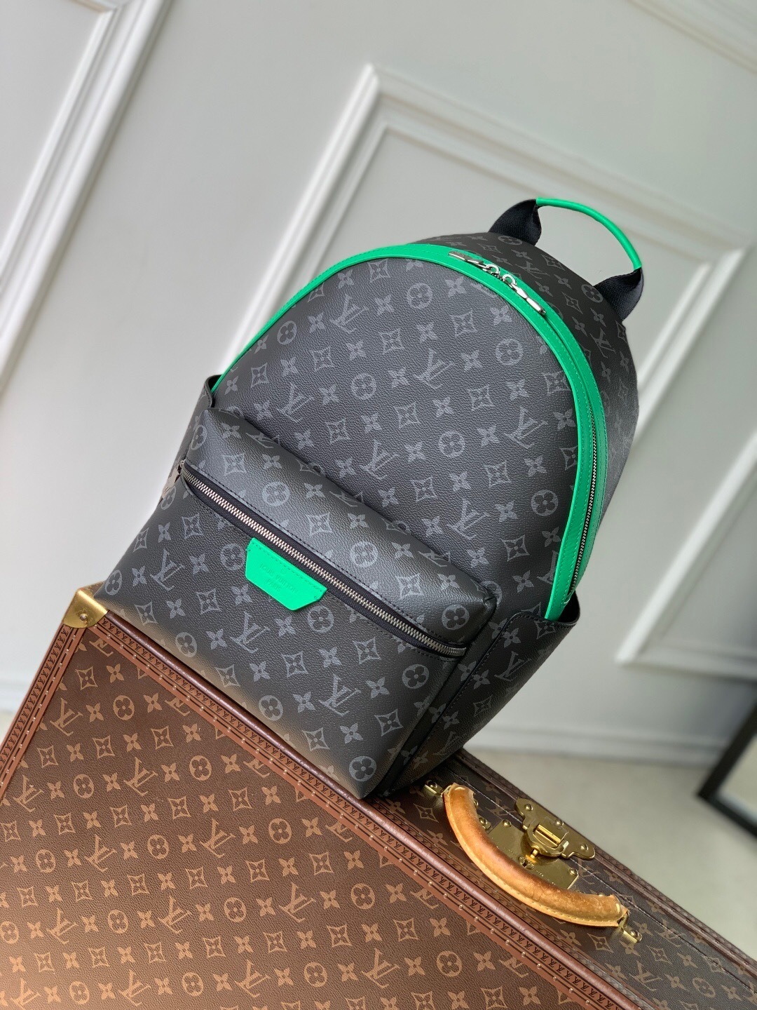 LV Discovery Backpack PM in Monogram Eclipse canvas with bright green cowhide leather accents
