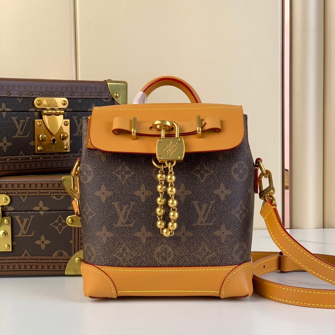 LV Nano Steamer bag in Monogram canvas with natural cowhide leather trim and gold-tone hardware