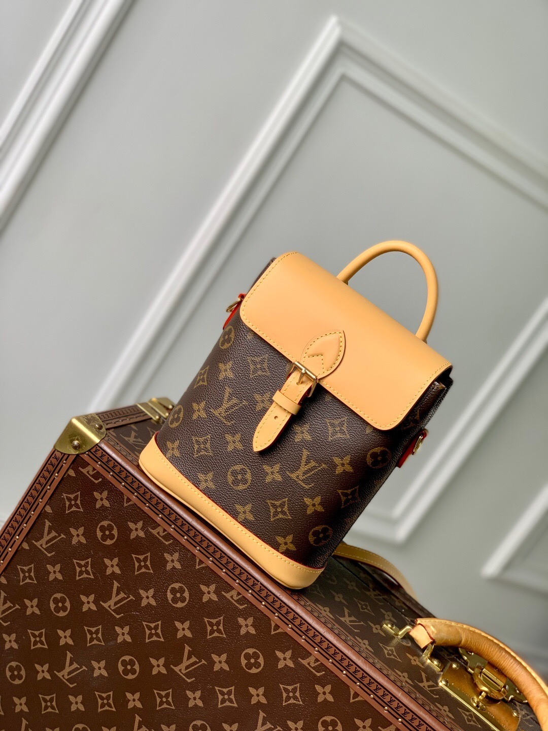 LV Soho Mini backpack in Monogram canvas with natural cowhide leather trim