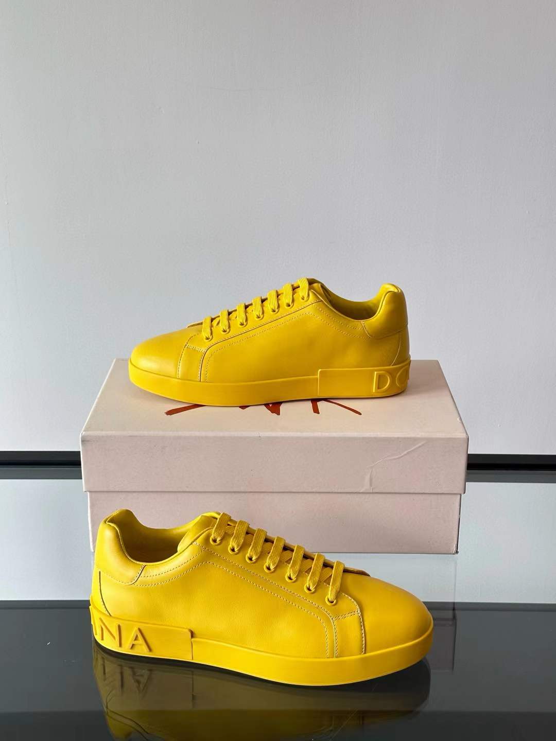 Dolce & Gabbana Portofino leather sneakers in a fluorescent yellow hue