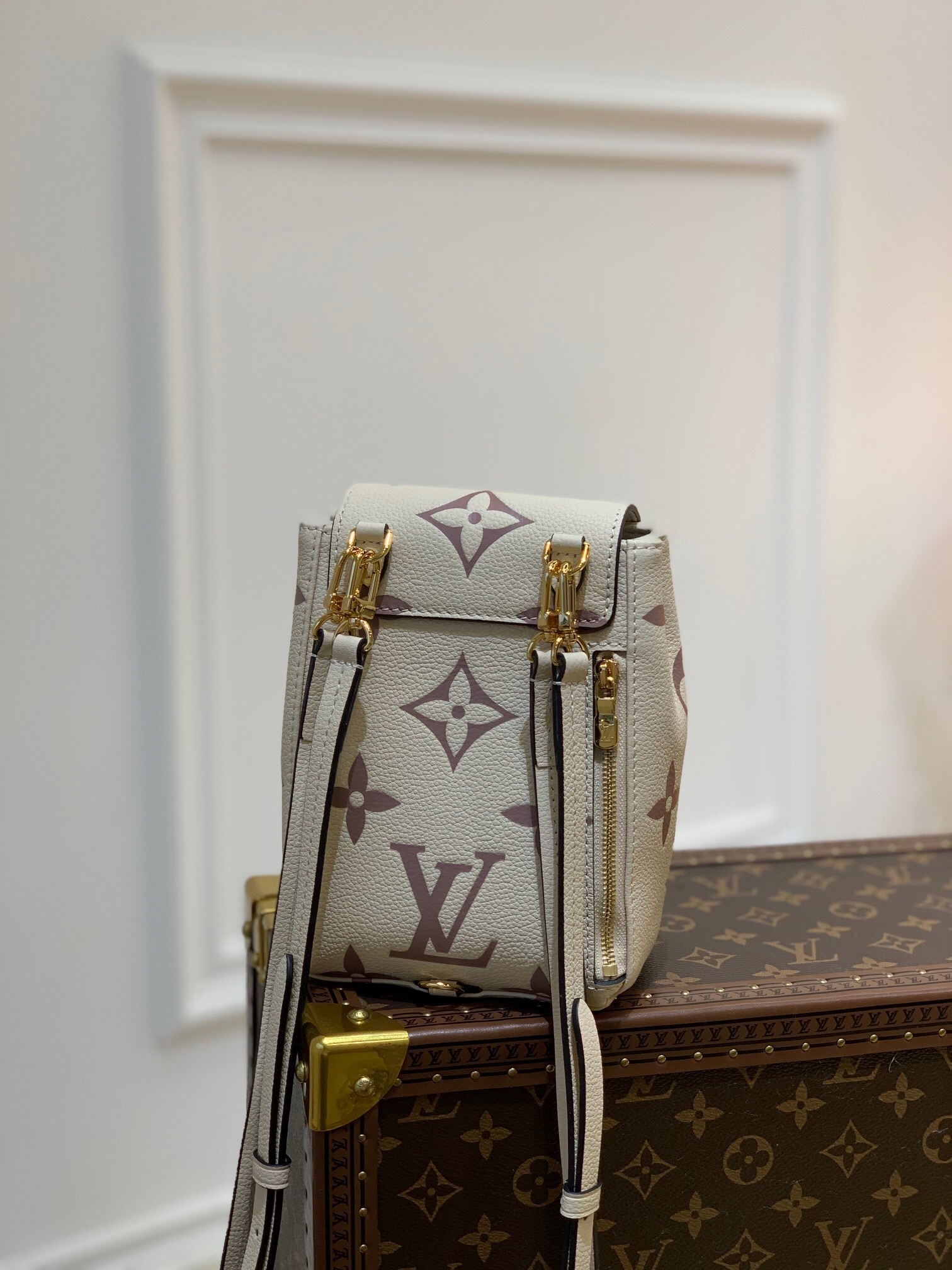 LV Tiny Backpack in the Bicolor Monogram Empreinte embossed leather