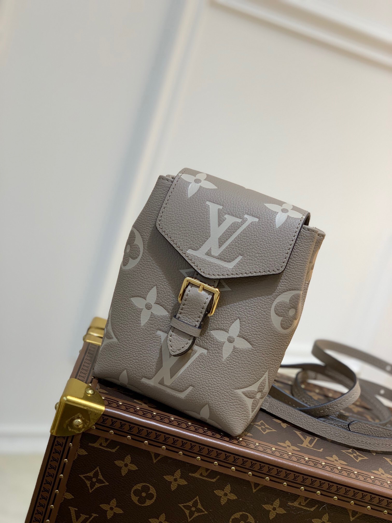 LV Bicolor Monogram Empreinte Tiny Backpack in tourterelle (grey/beige) leather with gold hardware