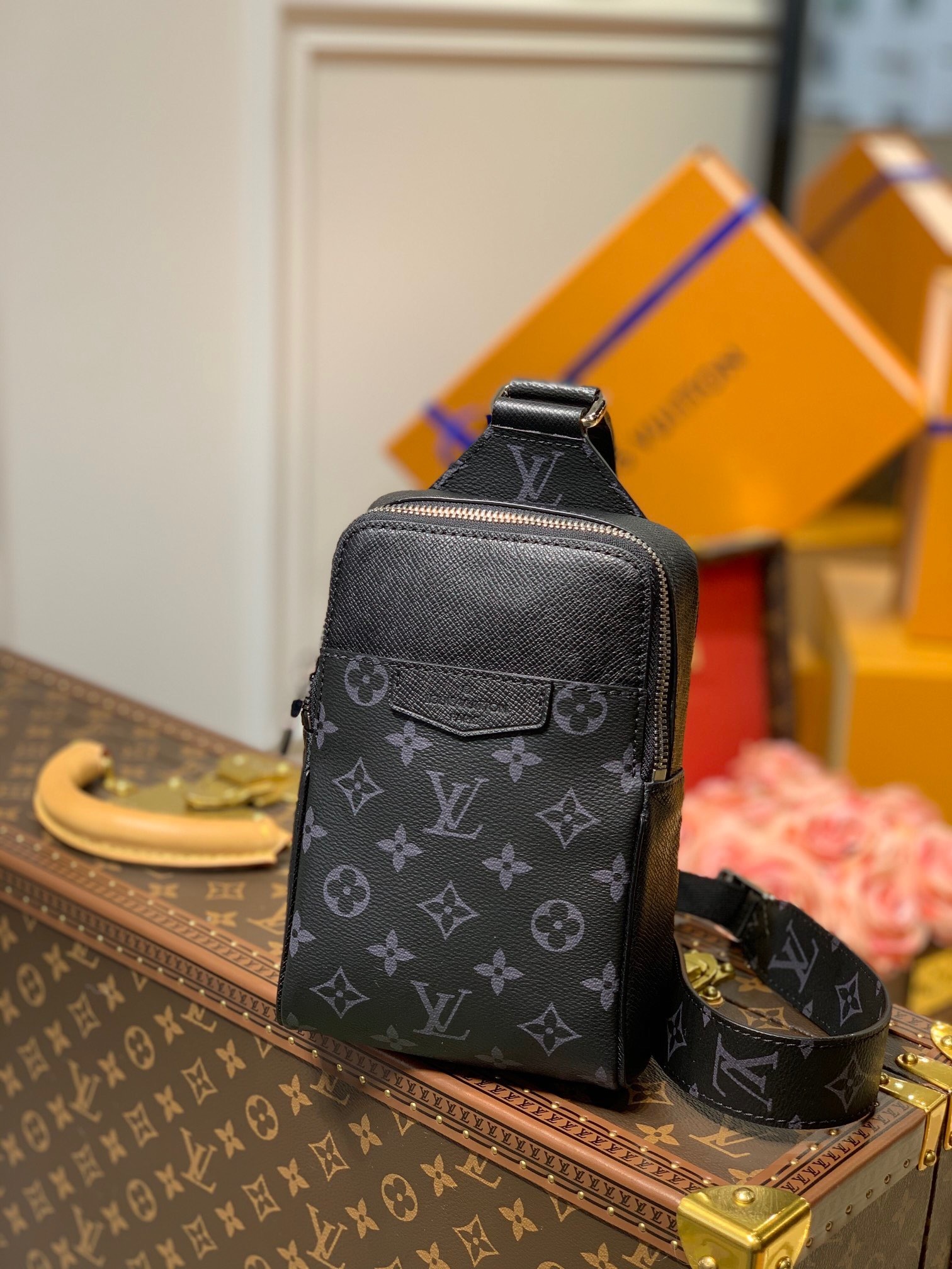 LV Outdoor Sling Bag in Monogram canvas and black Taiga cowhide leather