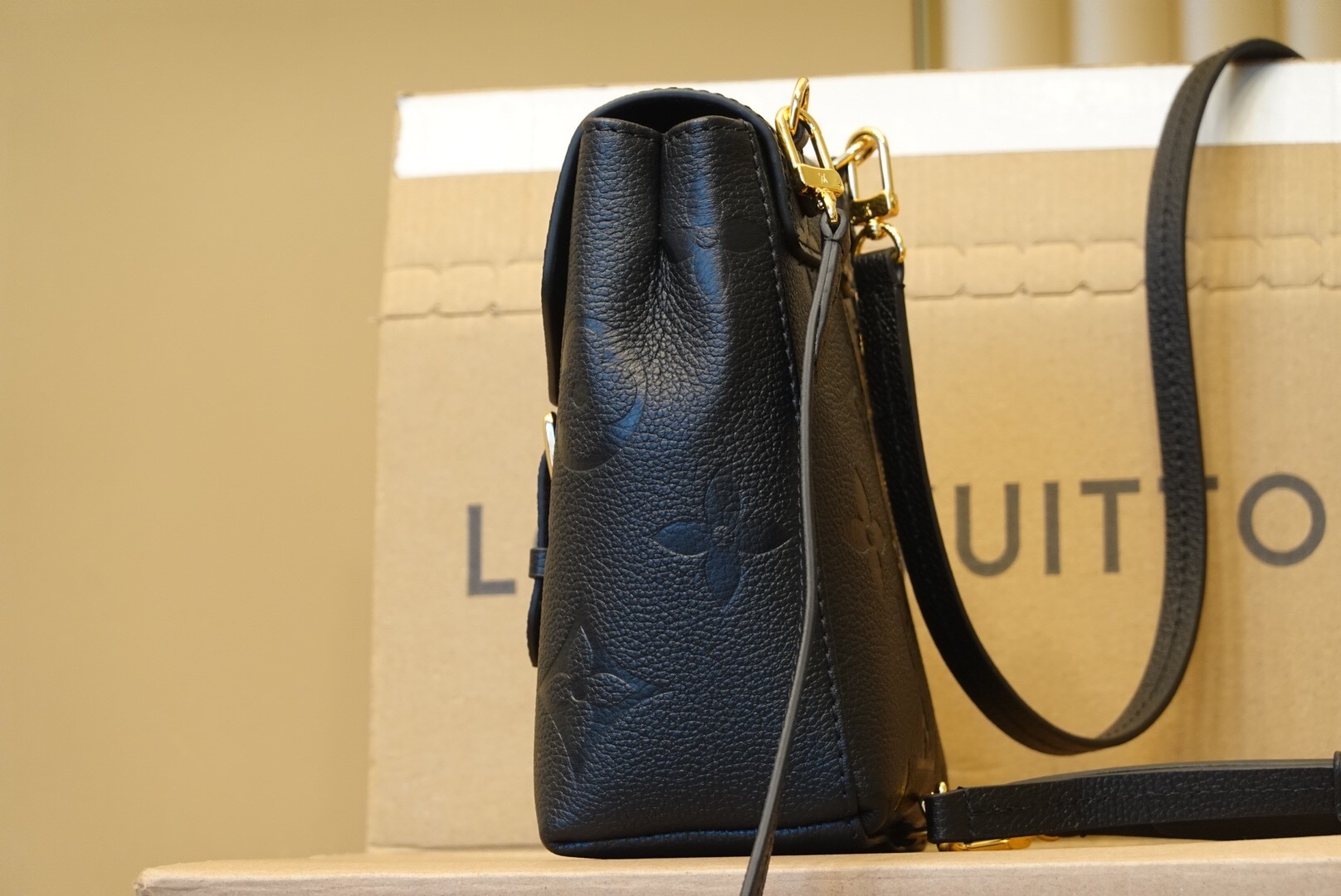 LV Tiny Backpack in black Monogram Empreinte leather
