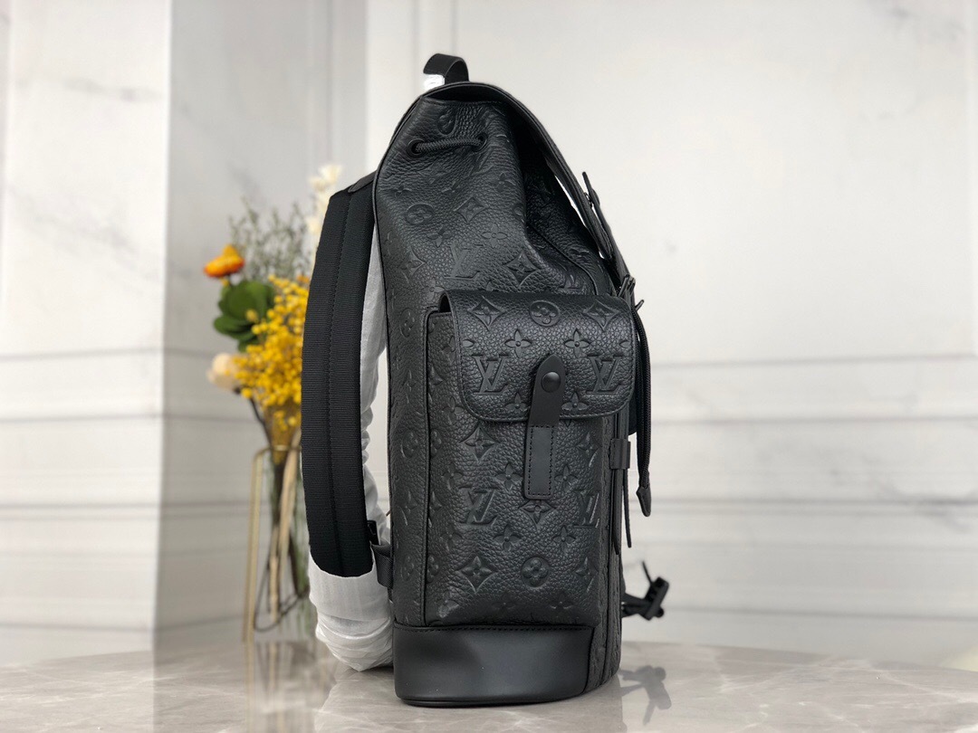 LV Christopher backpack in black Taurillon leather with an embossed Monogram motif