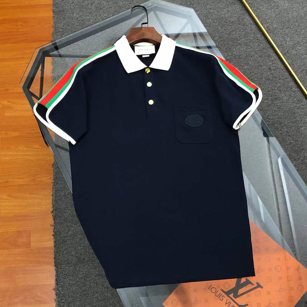 Gucci polo shirt with a white and black collar and signature Web-stripe trim on the sleeves