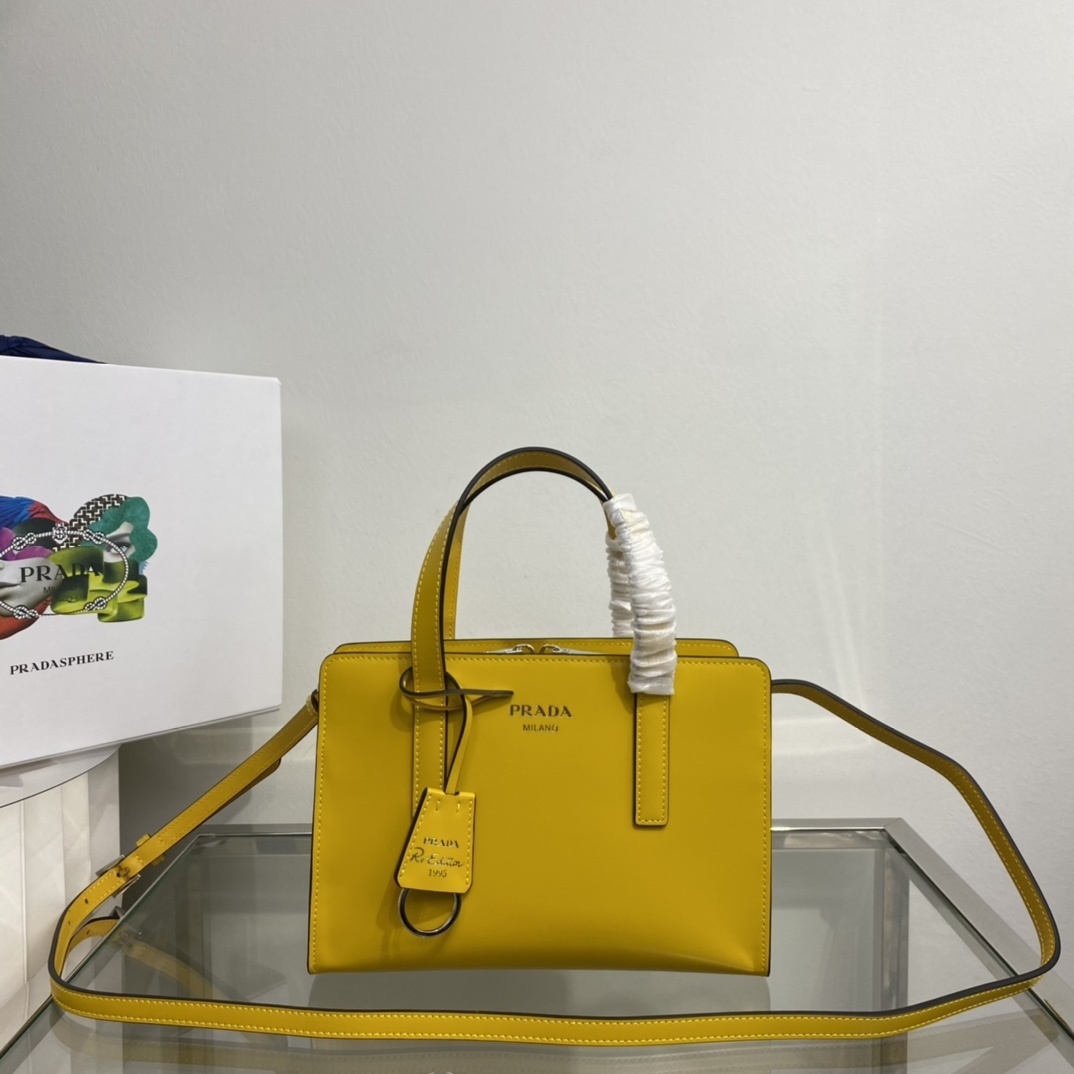 Prada Re-Edition 1995 brushed leather tote bag in yellow