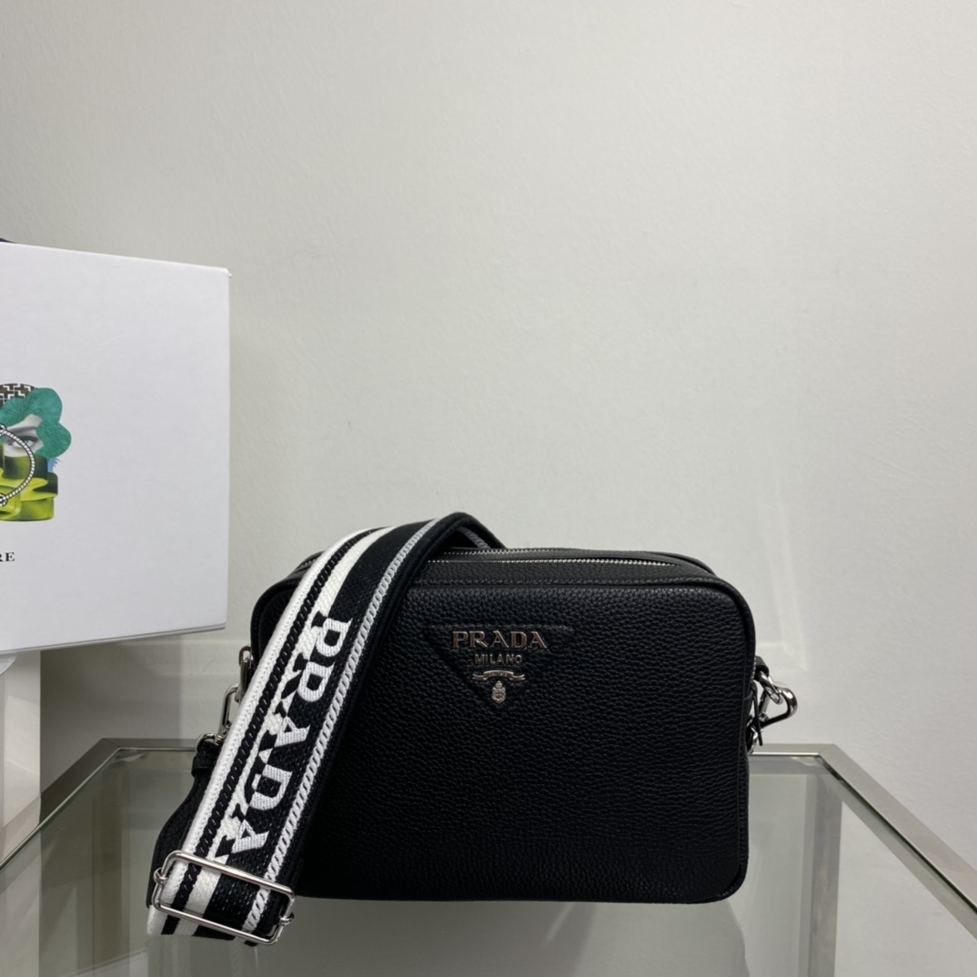 Prada Saffiano leather shoulder bag black with a removable and adjustable logo-woven strap.