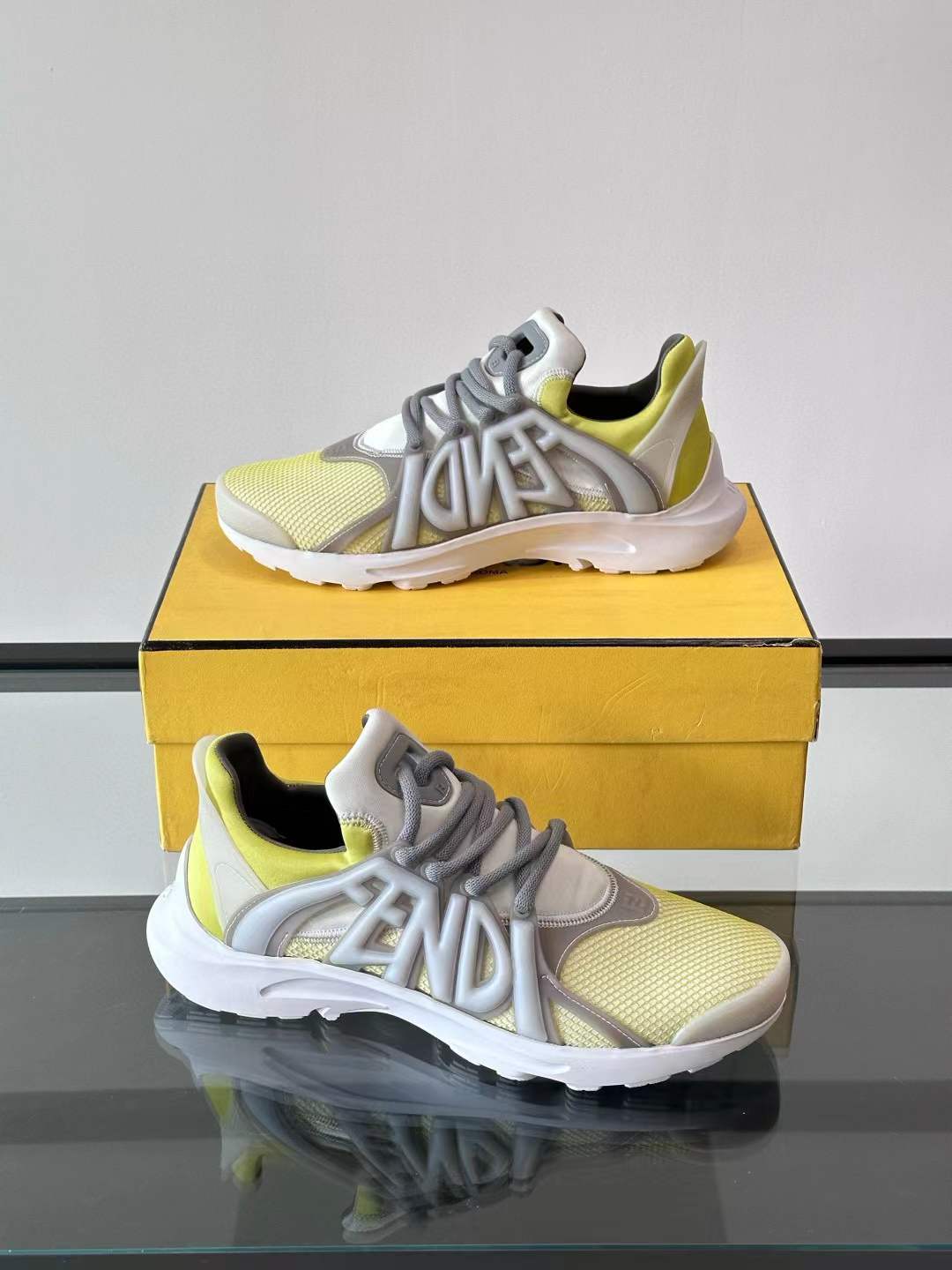 Fendi Tag technical mesh low-top sneakers in yellow