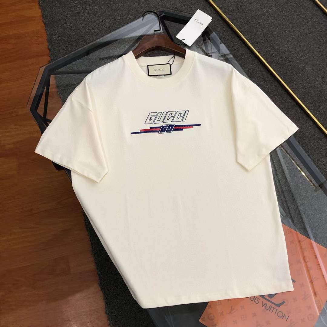 Gucci white cotton jersey T-shirt with a logo and "69" print on the front