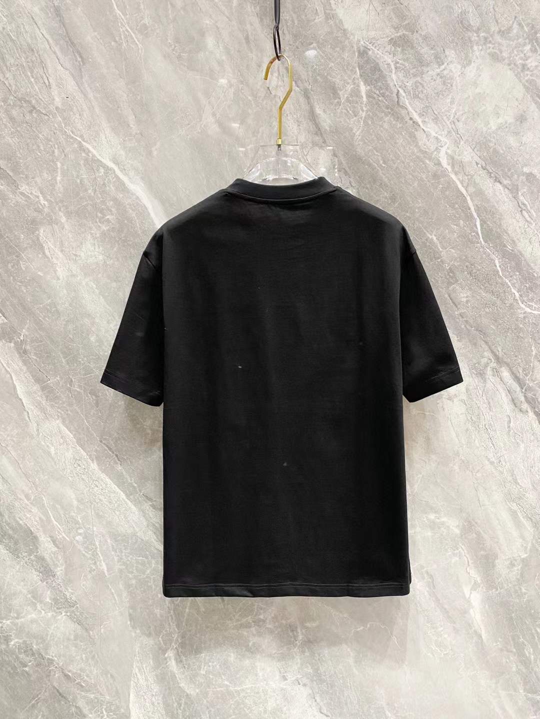 Loewe Anagram cotton jersey T-shirt with a graphic print.