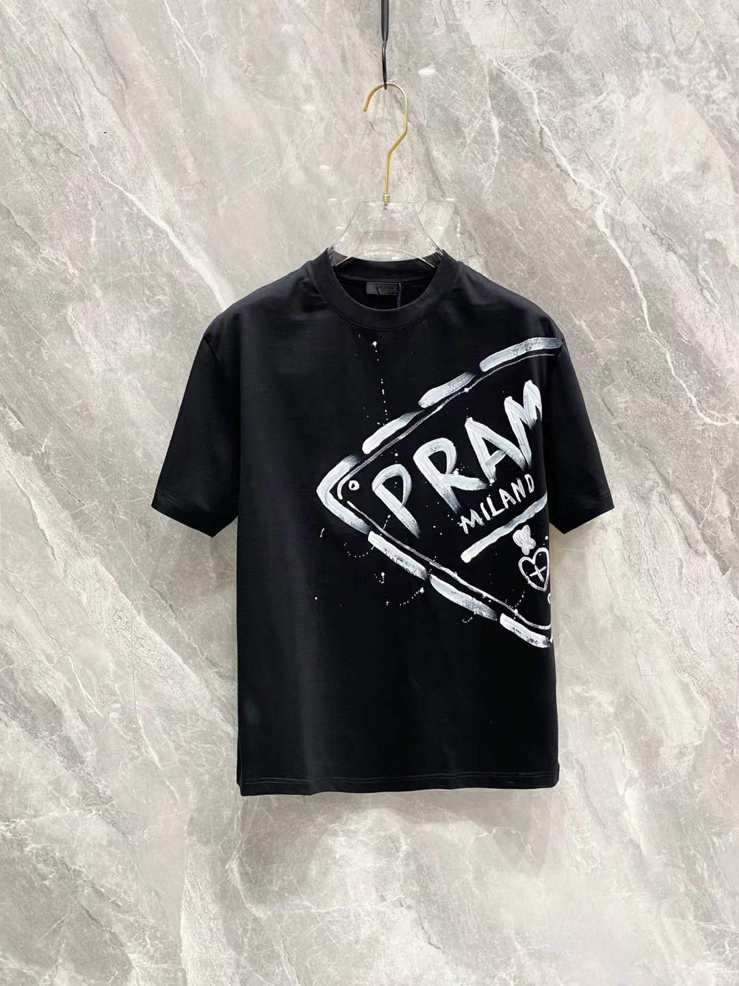 Prada cotton t-shirt with a white painted logo graphic