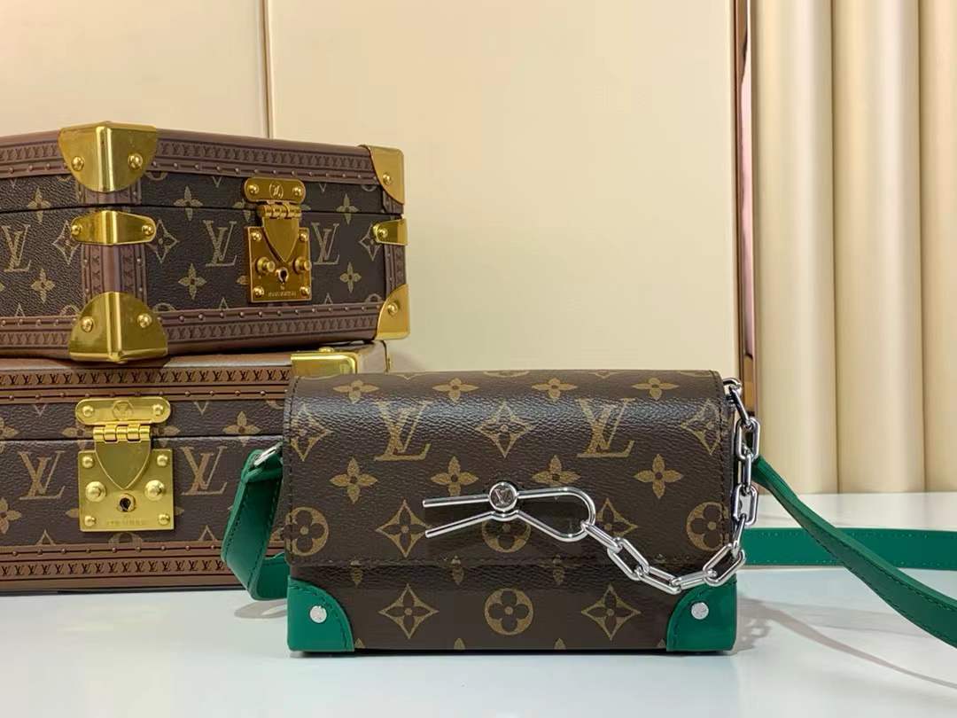 LV Steamer Wearable Wallet in Monogram Macassar canvas with green reinforced corners and an adjustable strap