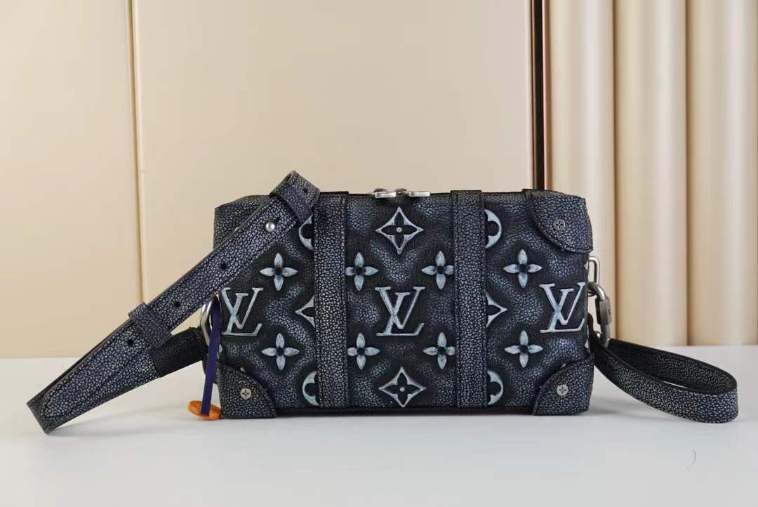 LV Soft Trunk Wallet in black Taurillon leather with a faded monogram pattern
