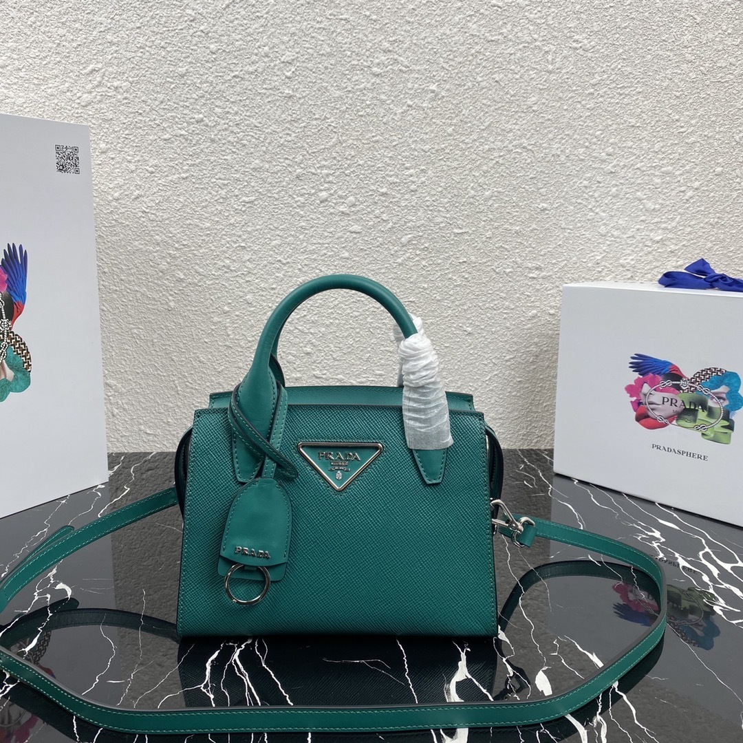 Prada Kristen Saffiano Mini Leather Top-Handle Bag in a teal or green color