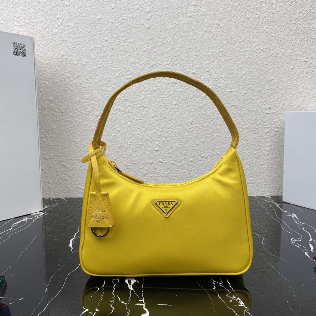 Prada Re-Edition 2000 mini-bag in citron yellow Re-Nylon with a leather shoulder strap