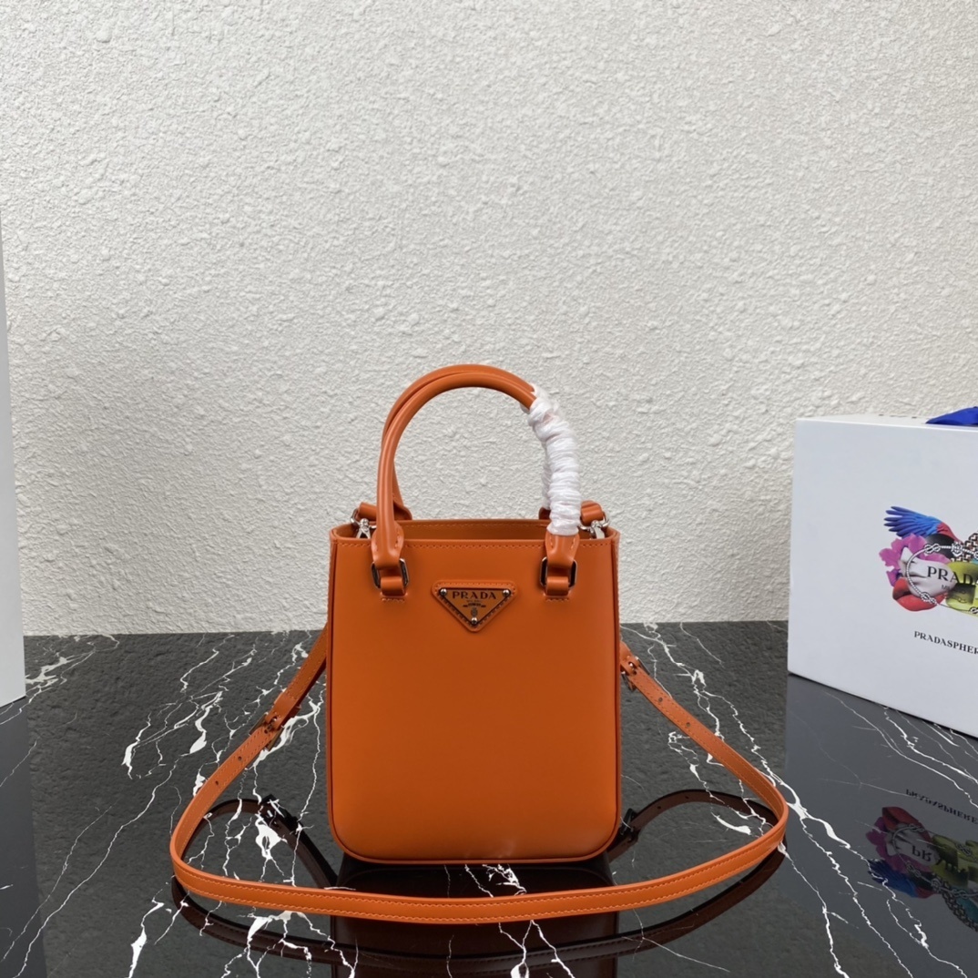 Prada small leather tote bag in orange
