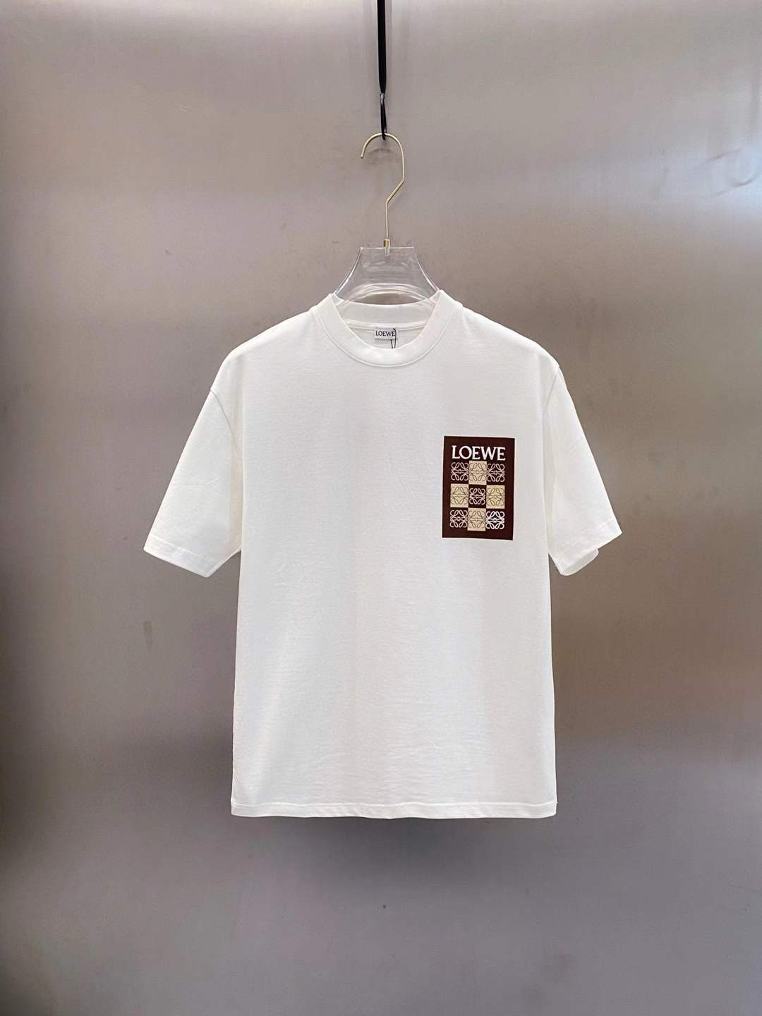 Loewe Anagram cotton-jersey T-shirt in white with a checkered patch