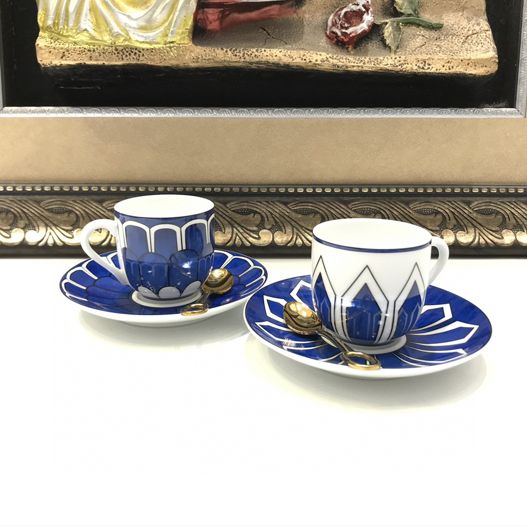 Hermès Bleus d'Ailleurs porcelain dinnerware various plates and bowls in a blue and white motif