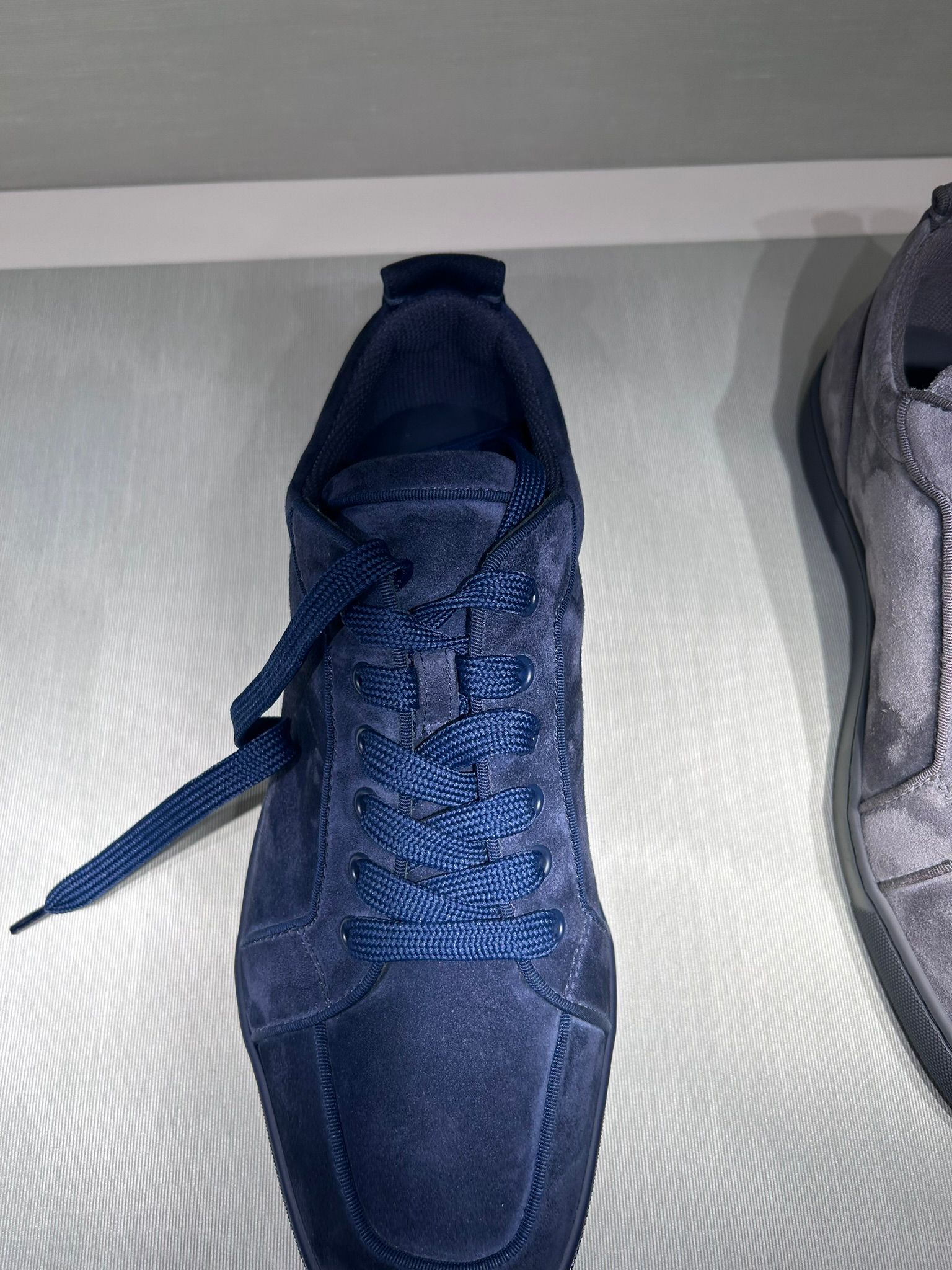 Christian Louboutin Louis Junior low-top sneaker in navy veau velours