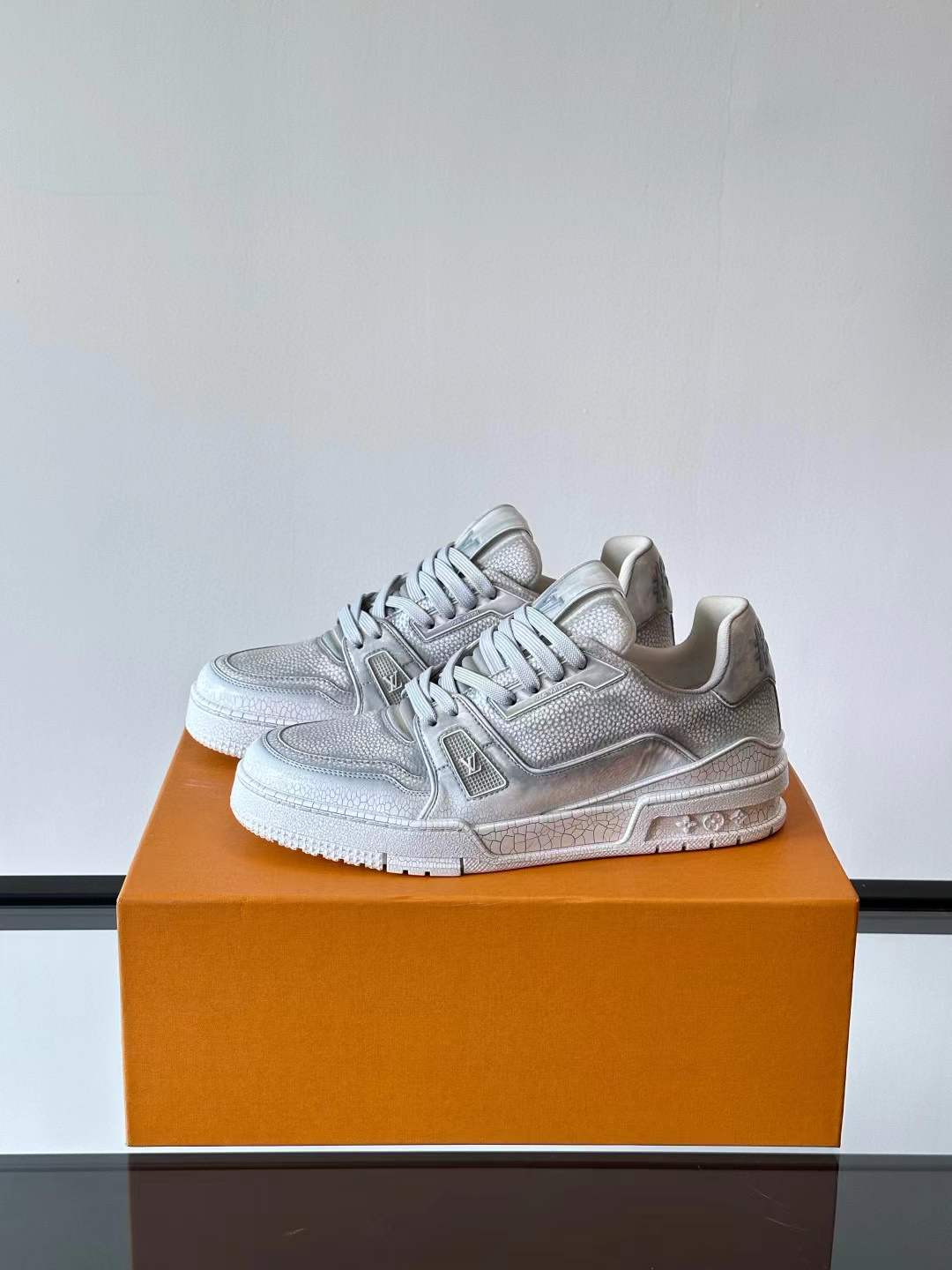 LV Trainer sneaker in silver with rhinestones