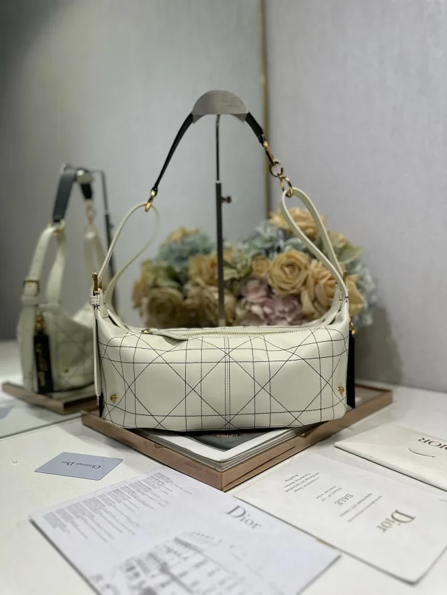 Dior D-Journey bag in white flat Macrocannage calfskin with contrasting black topstitching