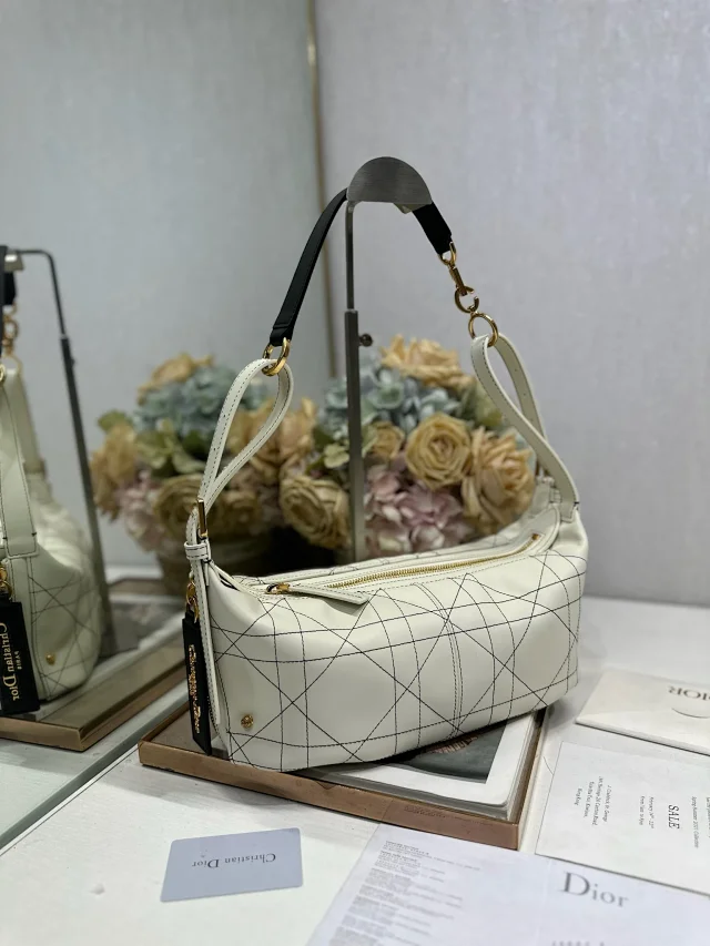 Dior D-Journey bag in white flat Macrocannage calfskin with contrasting black topstitching