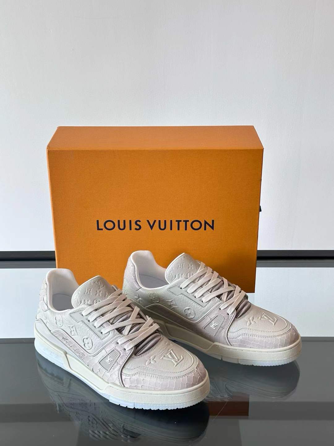 LV Trainer low-top sneaker in monochrome patent calf leather embossed with the Mini Monogram pattern