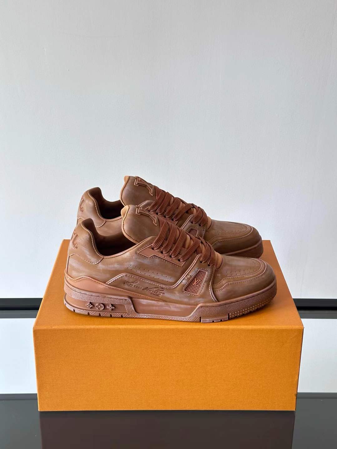 LV Trainer sneakers brown colorway vintage-effect calf leather Brown checkerboard variant