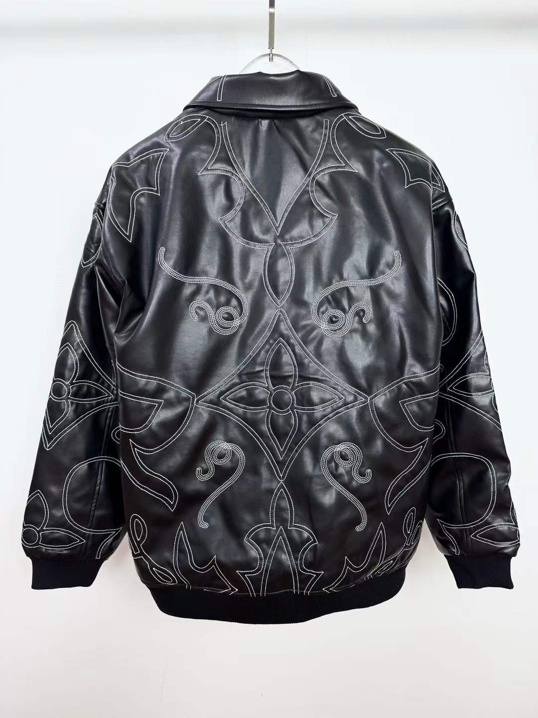 LV Monogram Embroidered Leather Bomber Jacket featuring the LV Arabesque motif and a pearl-ornamented zip puller