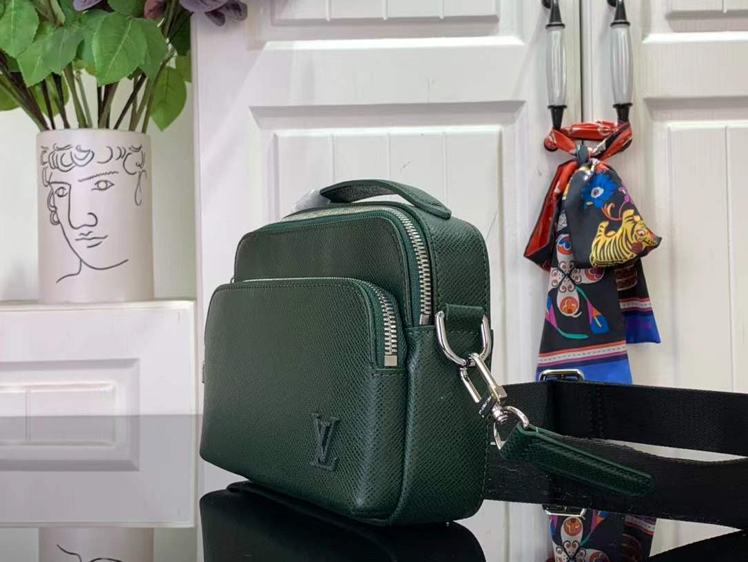 LV Avenue Messenger bag in green Taiga leather.