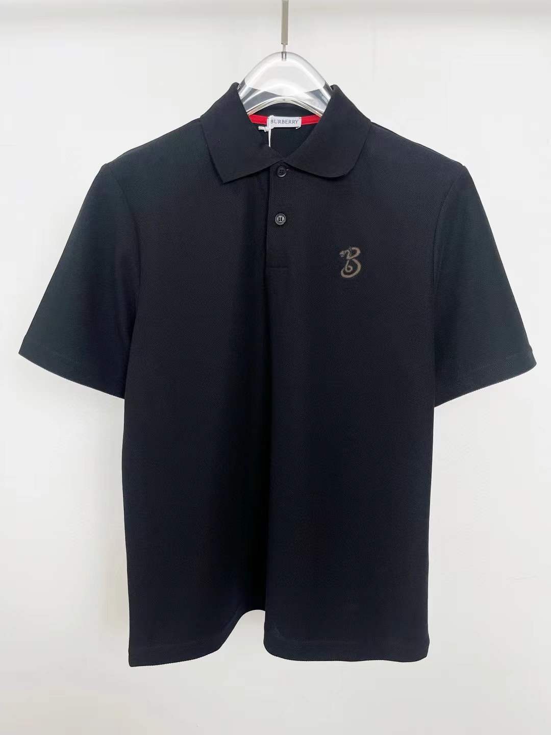 Burberry polo shirt with the TB monogram logo