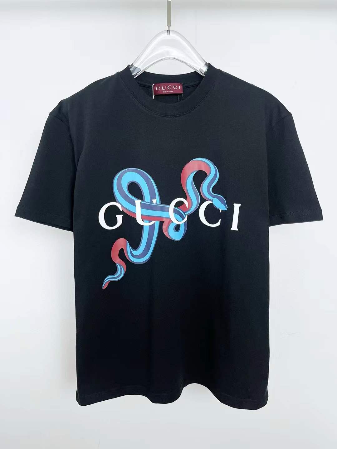 Gucci T-shirt with a distinctive snake and logo print