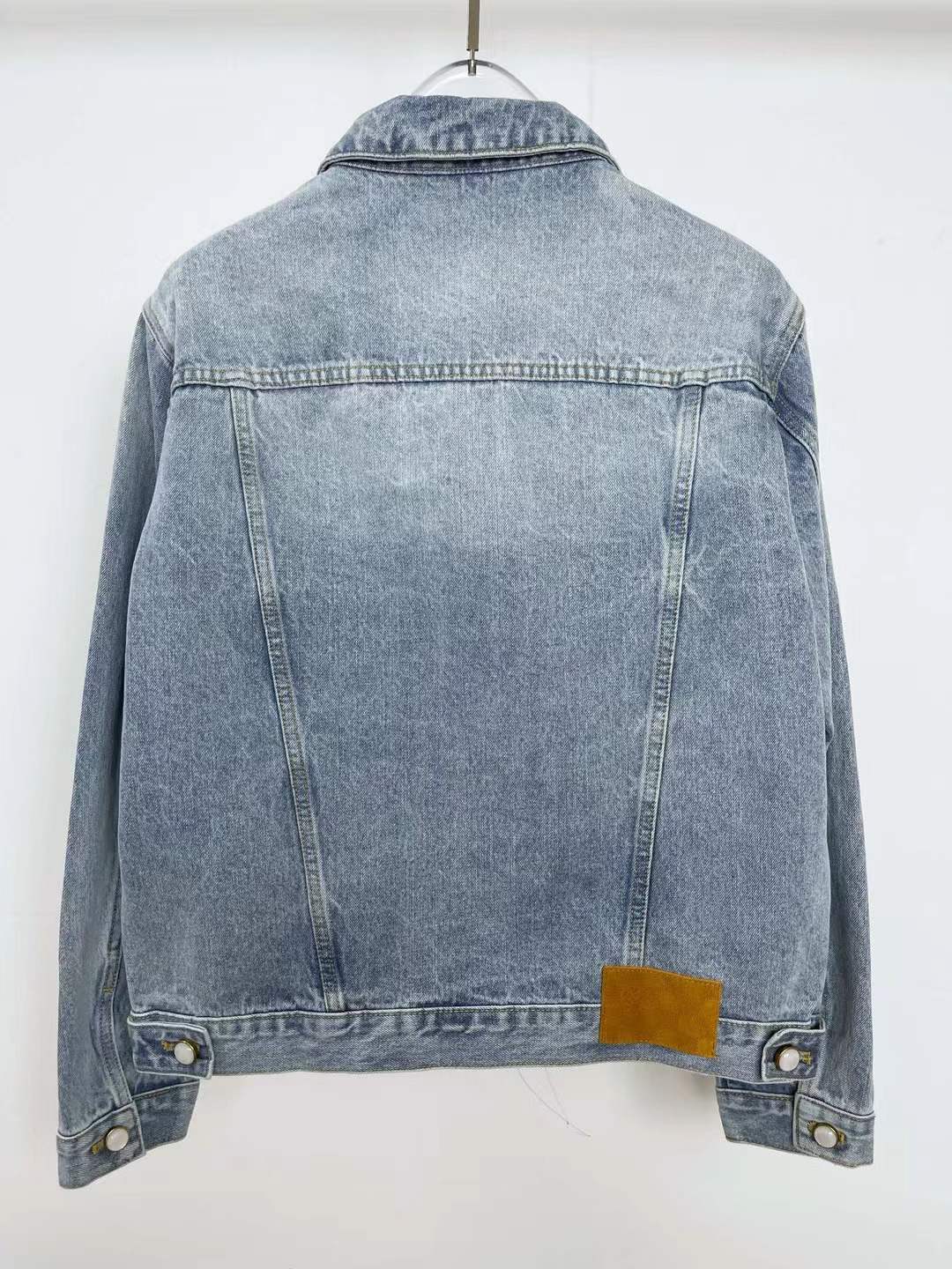 LV Fluid Denim Jacket in faded blue cotton.