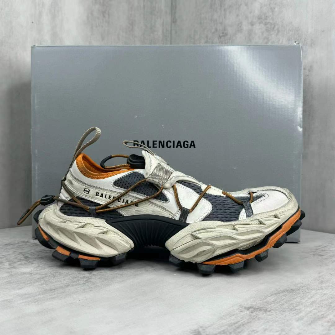 Balenciaga Hike sneaker in beige and orange with a distressed mesh upper