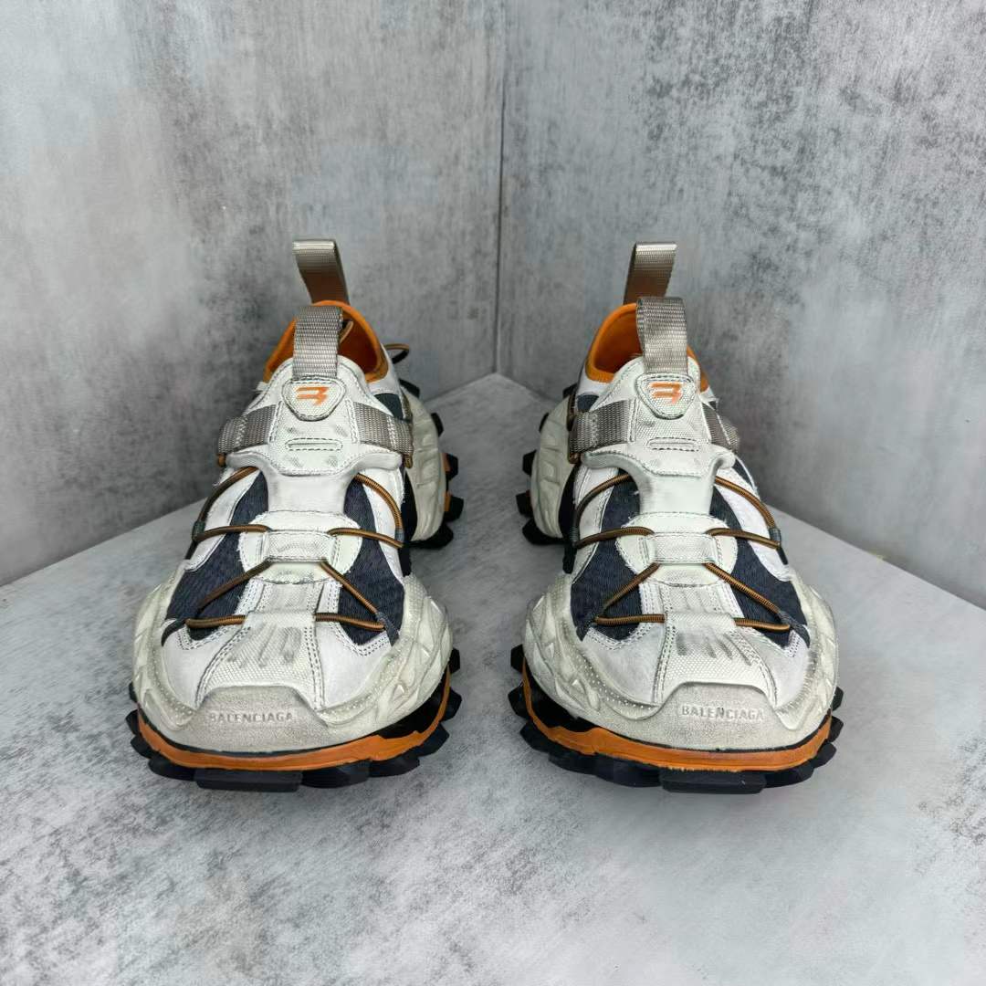 Balenciaga Hike sneaker in beige and orange with a distressed mesh upper