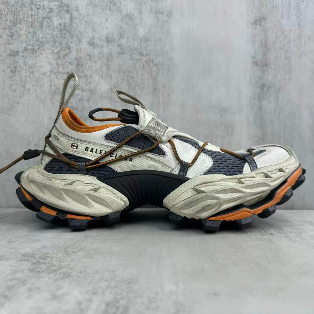 Balenciaga Hike sneaker in beige and orange with a distressed mesh upper