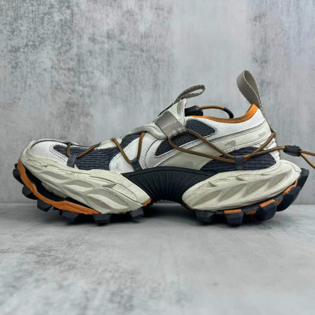 Balenciaga Hike sneaker in beige and orange with a distressed mesh upper