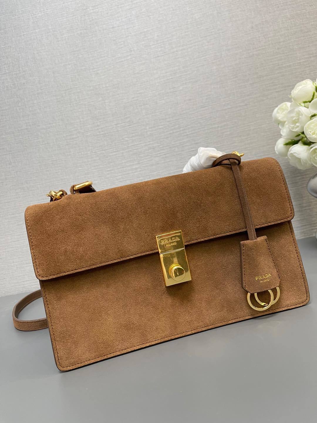 Prada Soft Sound suede shoulder bag in brown