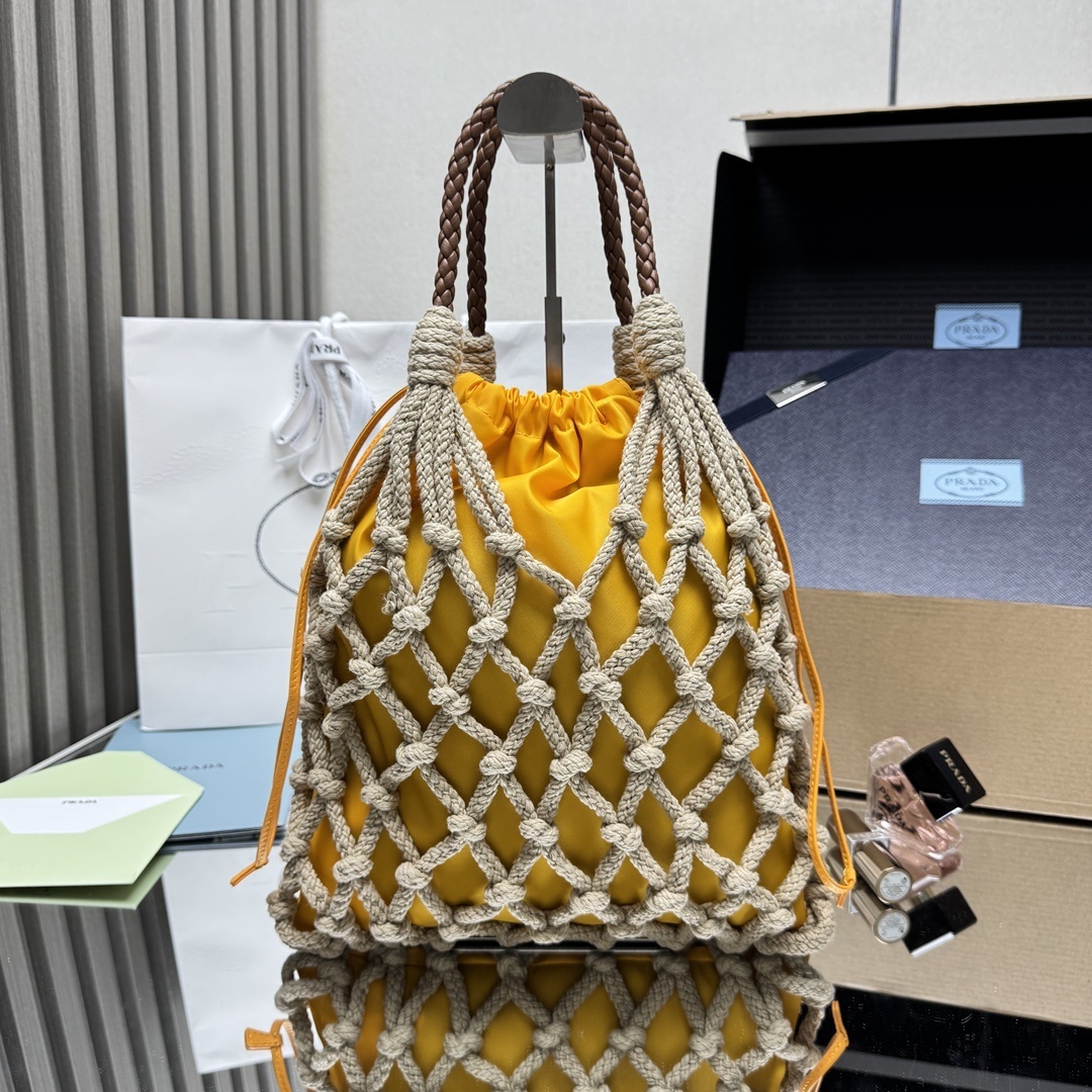 Prada medium Noué tote bag in cotton cord macramé with a yellow Re-Nylon drawstring pouch