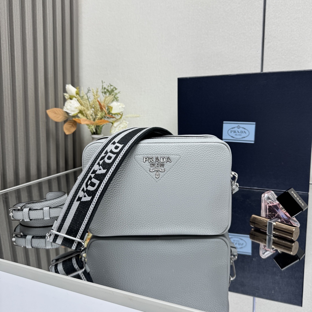 Prada leather shoulder bag with a removable and adjustable logo-print woven nylon shoulder strap