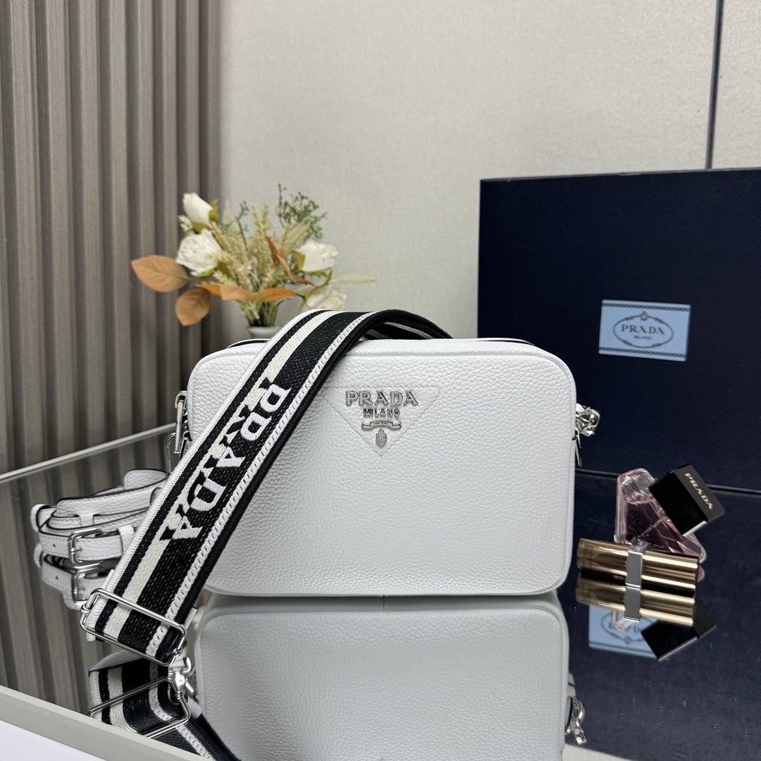 Prada leather shoulder bag with a black and white logo-print strap white