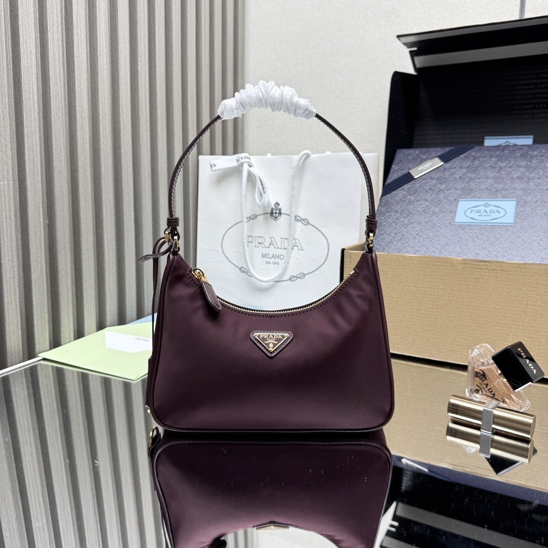 Prada Re-Edition 2005 Re-Nylon and Saffiano mini bag in burgundy recycled nylon