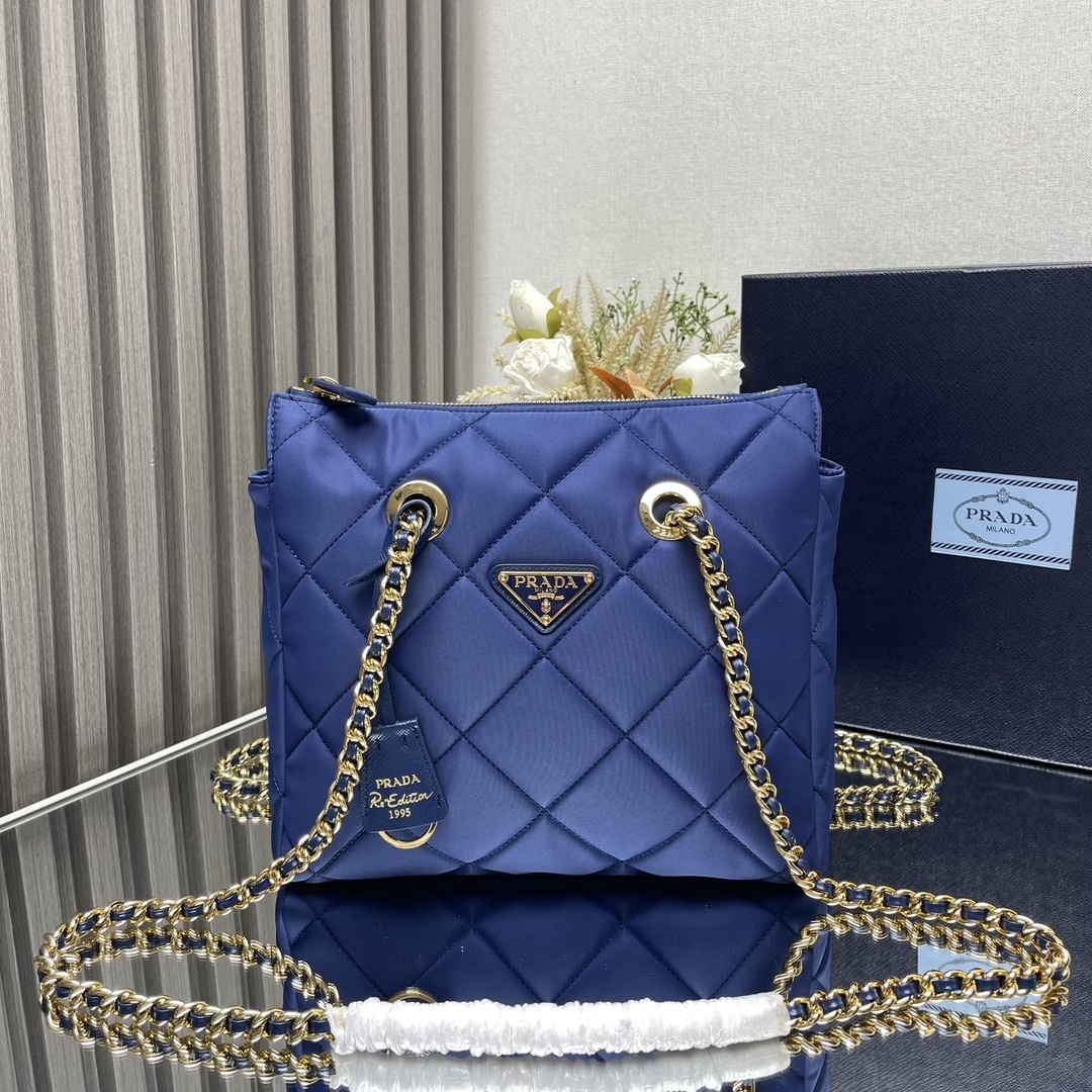 Prada Re-Nylon tote bag featuring quilted top-stitching and chain handles