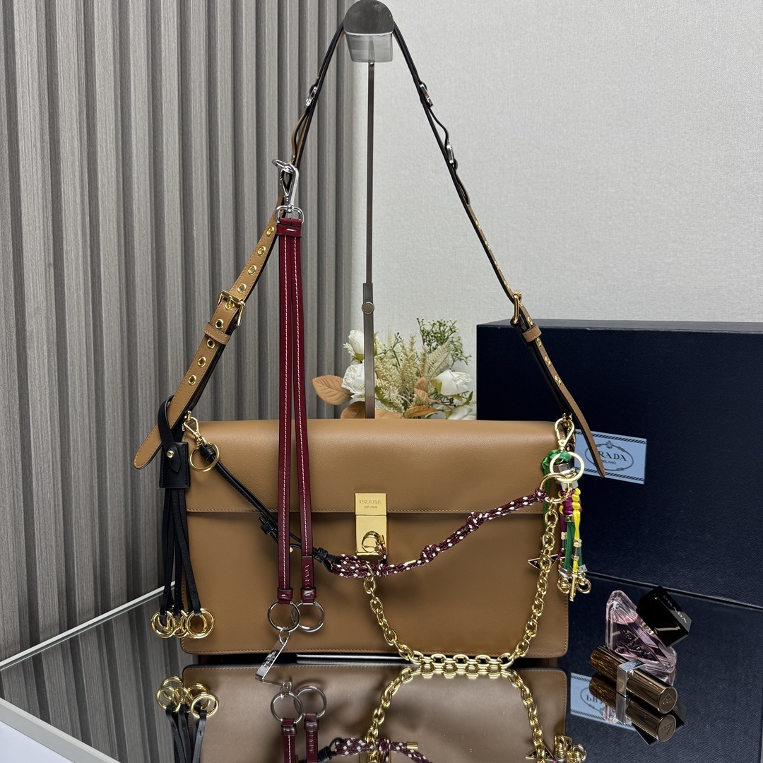 Prada Soft Sound leather shoulder bag in cognac brown