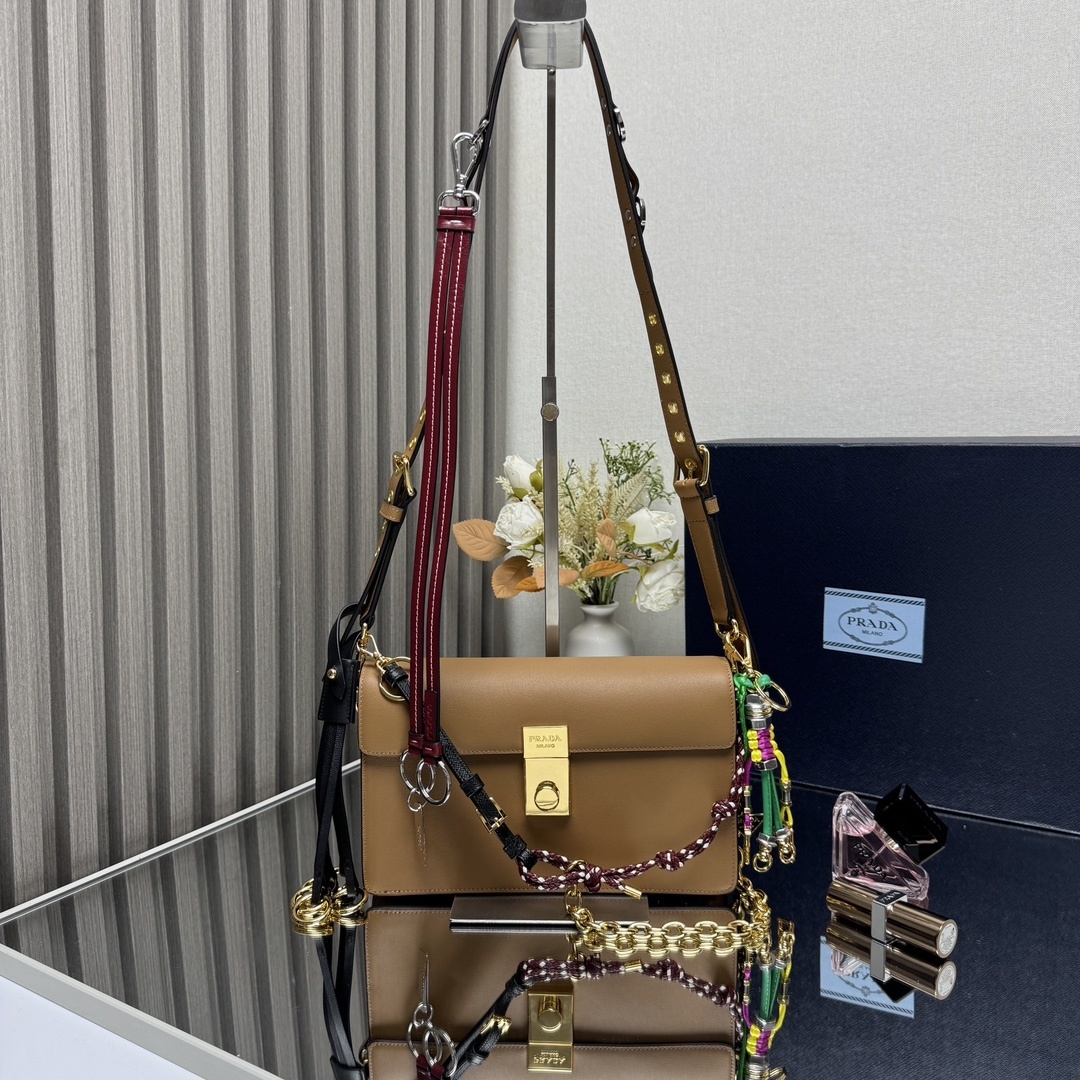 Prada Soft Sound small leather shoulder bag in caramel brown with removable charms