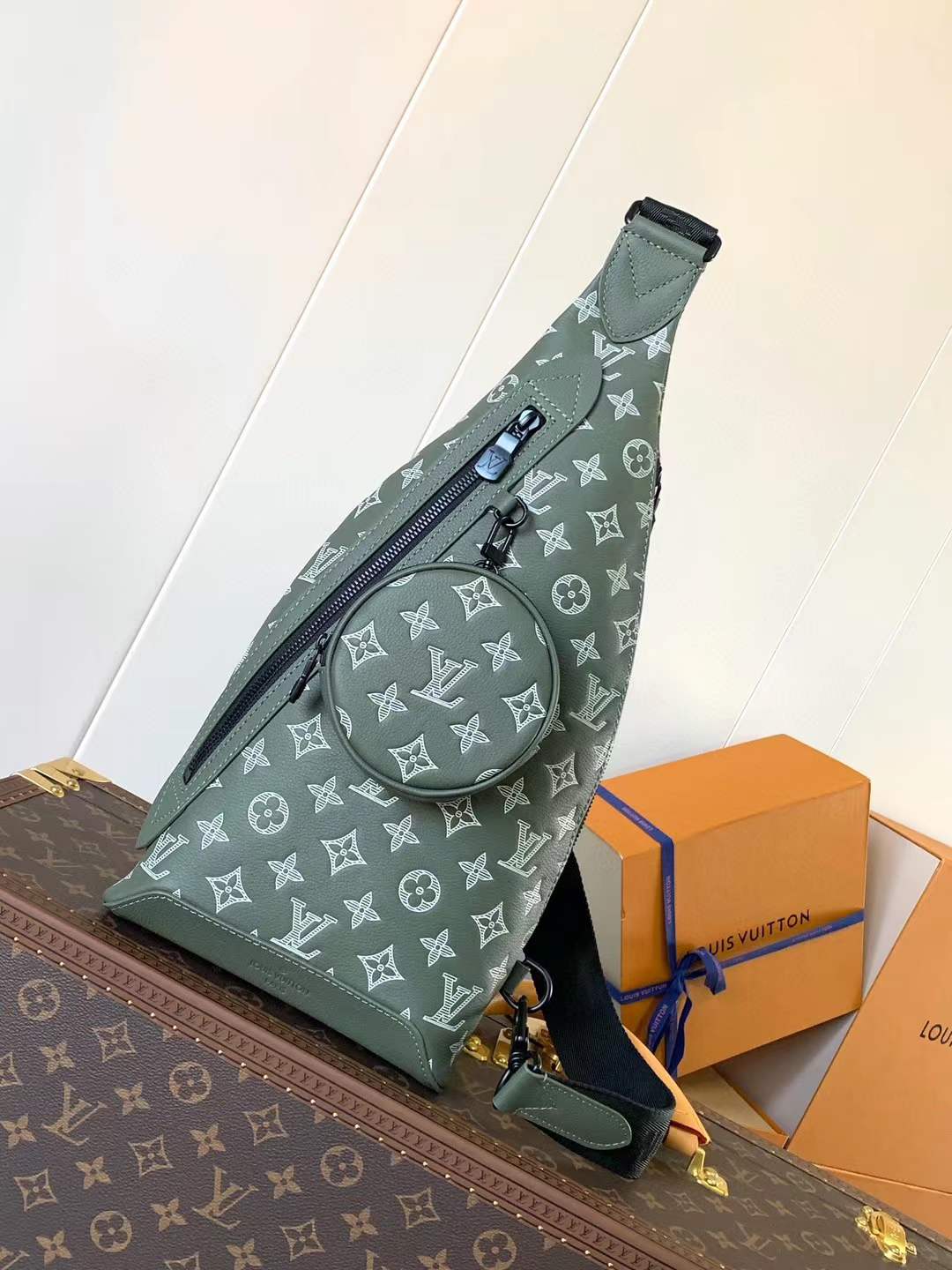 LV Duo Slingbag in the Monogram Shadow leather material and green color